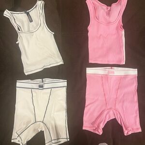 SKIMS Pink and White PJ shorts set